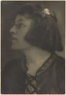 Portrait of a Woman with Butterfly Hair Clip, 1907-1943. Creator: Louis Fleckenstein
