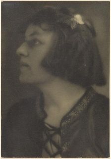 Portrait of a Woman with Butterfly Hair Clip, 1907-1943. Creator: Louis Fleckenstein