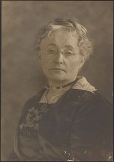 Portrait of a Woman with Glasses, 1907-1924. Creator: Louis Fleckenstein