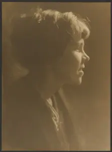 Portrait of a Woman with Hair in Loose Bun, 1907-1943. Creator: Louis Fleckenstein