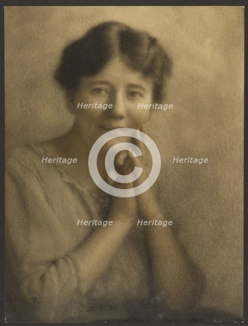 Portrait of a Woman with Hands Clasped at Face, 1907-1924. Creator: Louis Fleckenstein.