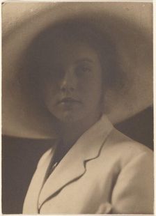 Portrait of a Woman with Large Straw Hat, 1907-1943. Creator: Louis Fleckenstein