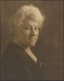 Portrait of a Woman with Pearls and Bar Pin, 1907-1924. Creator: Louis Fleckenstein