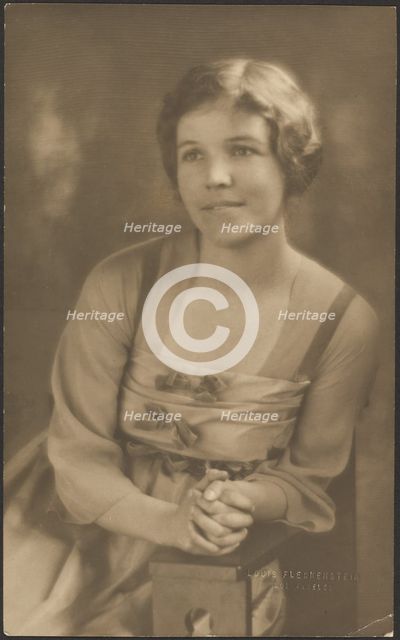 Portrait of a Woman with Ribbon Bows on Dress, 1907-1924. Creator: Louis Fleckenstein.