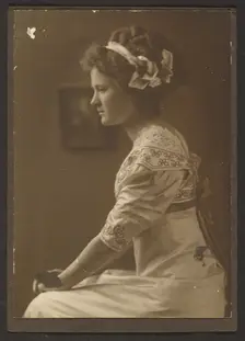 Portrait of a Woman with Ribbons in her Hair, 1907-1943. Creator: Louis Fleckenstein