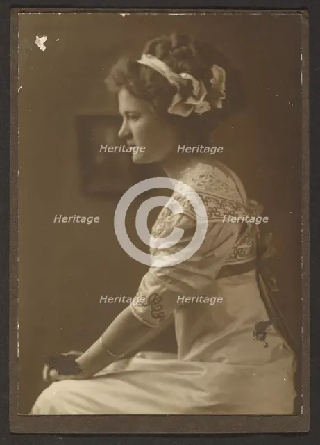 Portrait of a Woman with Ribbons in her Hair, 1907-1943. Creator: Louis Fleckenstein.
