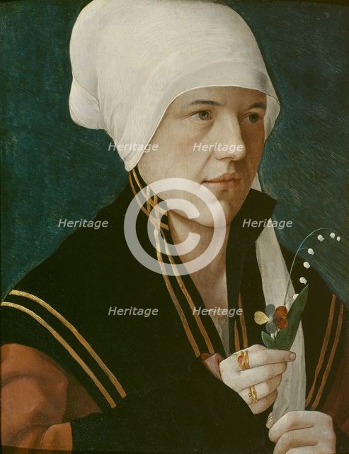 Portrait of a woman holding a Lily-of-the-Valley and a pansy, before 1520.