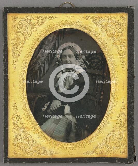 Portrait of a woman in bonnet, seated, about 1850. Creator: Unknown.
