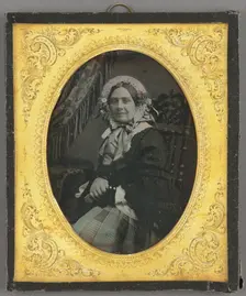 Portrait of a woman in bonnet, seated, about 1850. Creator: Unknown