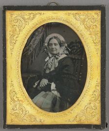 Portrait of a woman in bonnet, seated, about 1850. Creator: Unknown