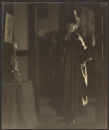 Portrait of a Woman in Doorway, 1907-1943. Creator: Louis Fleckenstein