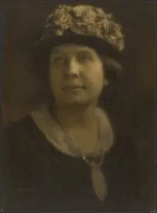 Portrait of a Woman in Floral Hat, 1907-1924. Creator: Louis Fleckenstein