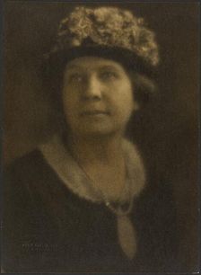 Portrait of a Woman in Floral Hat, 1907-1924. Creator: Louis Fleckenstein
