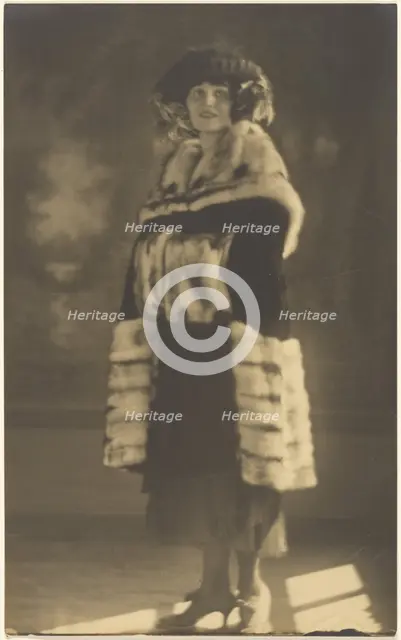 Portrait of a Woman in Fur Coat with Muff, 1907-1943. Creator: Louis Fleckenstein.