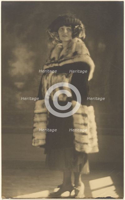 Portrait of a Woman in Fur Coat with Muff, 1907-1943. Creator: Louis Fleckenstein.