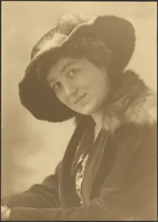 Portrait of a Woman in Fur Hat, 1907-1943. Creator: Louis Fleckenstein