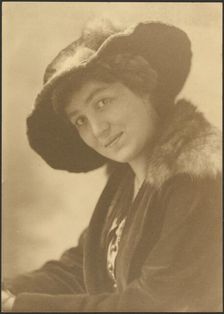 Portrait of a Woman in Fur Hat, 1907-1943. Creator: Louis Fleckenstein