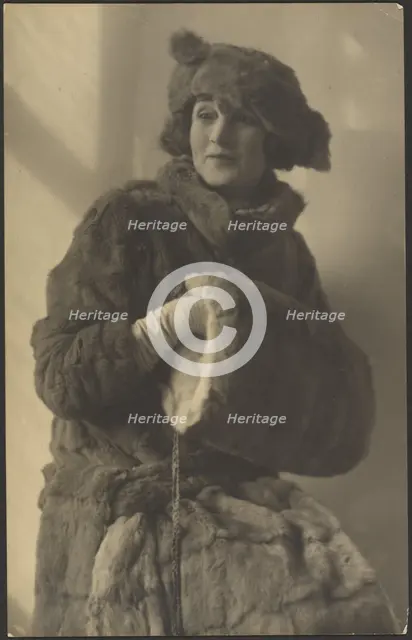 Portrait of a Woman in Furs with Muff, 1907-1943. Creator: Louis Fleckenstein.