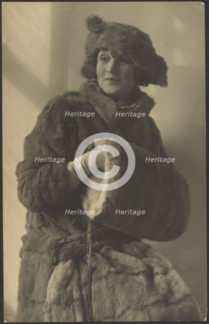 Portrait of a Woman in Furs with Muff, 1907-1943. Creator: Louis Fleckenstein.