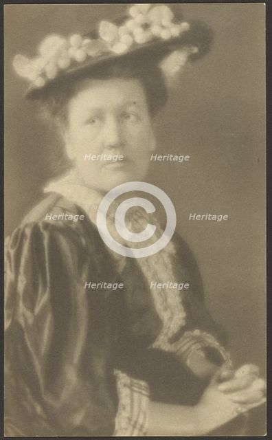 Portrait of a Woman in Hat with Dogwood Flowers, 1907-1943. Creator: Louis Fleckenstein.