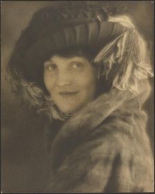 Portrait of a Woman in Hat with Feathers, 1907-1943. Creator: Louis Fleckenstein