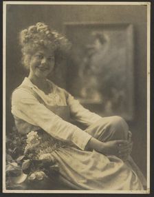 Portrait of a Woman in Pinafore with Flowers, 1907-1943. Creator: Louis Fleckenstein