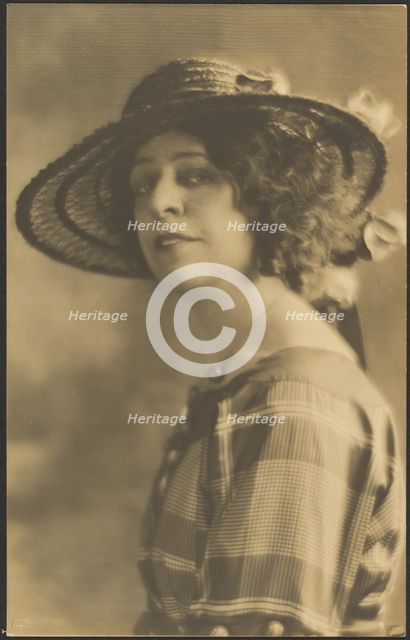 Portrait of a Woman in Plaid Dress, 1907-1943. Creator: Louis Fleckenstein.