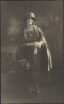 Portrait of a Woman Leaning on Bench, 1907-1924. Creator: Louis Fleckenstein