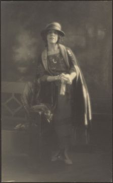 Portrait of a Woman Leaning on Bench, 1907-1924. Creator: Louis Fleckenstein