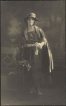 Portrait of a Woman Leaning on Bench, 1907-1924. Creator: Louis Fleckenstein