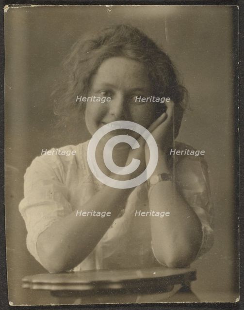 Portrait of a Woman Leaning on Table, 1907-1943. Creator: Louis Fleckenstein.