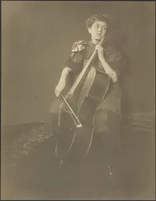 Portrait of a Woman Playing the Cello, 1895-1943. Creator: Louis Fleckenstein