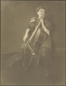 Portrait of a Woman Playing the Cello, 1895-1943. Creator: Louis Fleckenstein