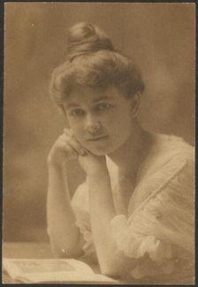Portrait of a Woman Seated with Magazine, 1907-1943. Creator: Louis Fleckenstein