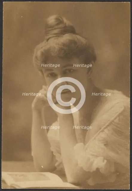 Portrait of a Woman Seated with Magazine, 1907-1943. Creator: Louis Fleckenstein.