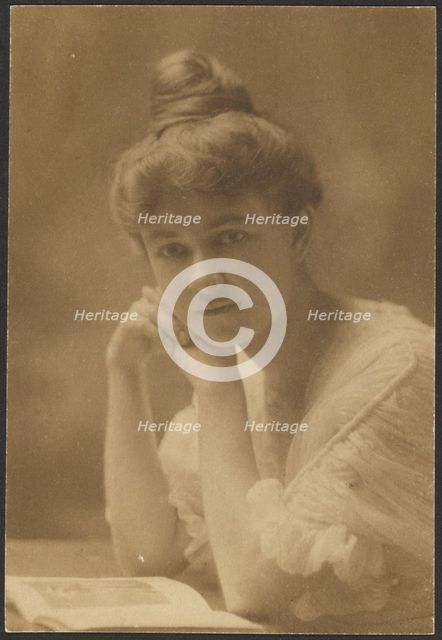 Portrait of a Woman Seated with Magazine, 1907-1943. Creator: Louis Fleckenstein.