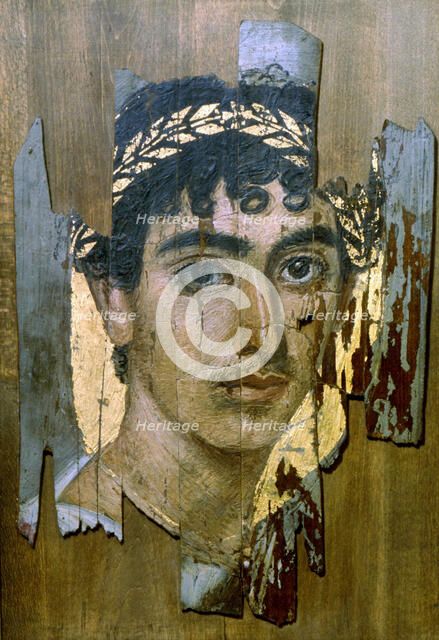 Portrait of a youth in a gold wreath, Fayum mummy portrait, Romano-Egyptian, early 2nd century. Artist: Unknown
