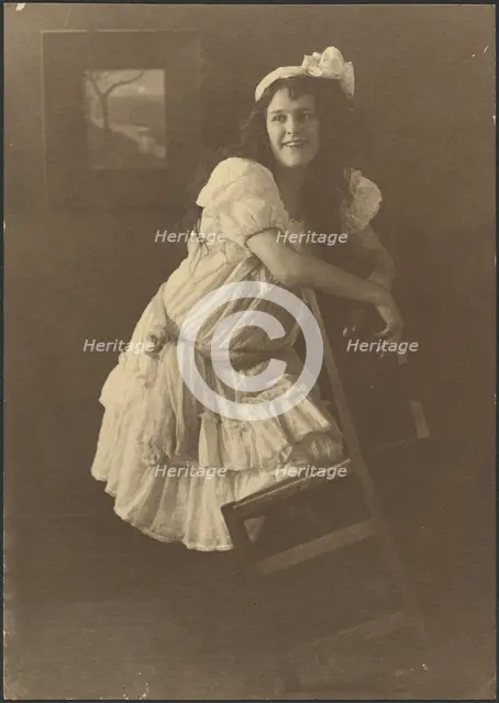 Portrait of a Young Woman with Chair, 1907-1943. Creator: Louis Fleckenstein.
