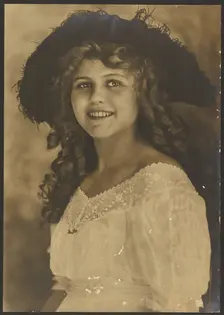 Portrait of a Young Woman with Corkscrew Curls, 1907-1943. Creator: Louis Fleckenstein