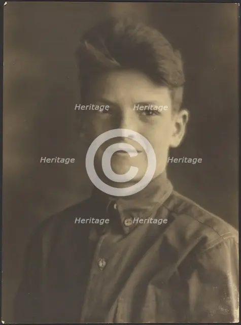 Portrait of a Young Boy in Button Up Shirt, 1907-1943. Creator: Louis Fleckenstein.