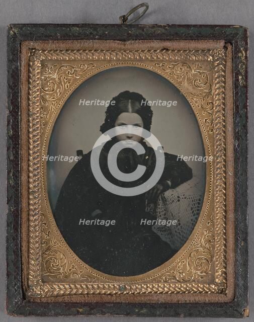 Portrait of a young girl dressed in dark clothes, wearing dark gloves, about 1860. Creator: Unknown.