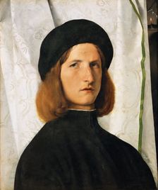 Portrait of a Young Man against a White Curtain