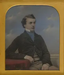 Portrait of a Young Man Seated at Table, about 1852. Creator: Richard Beard