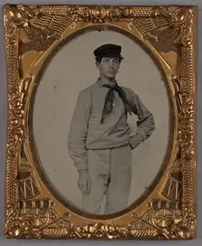 Portrait of a Young man wearing a cap and scarf, standing, about 1860. Creator: Unknown