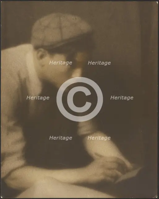 Portrait of a Young Man Writing a Note, 1907-1924. Creator: Louis Fleckenstein.