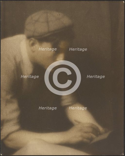 Portrait of a Young Man Writing a Note, 1907-1924. Creator: Louis Fleckenstein.