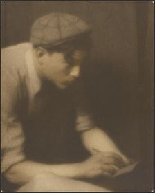 Portrait of a Young Man Writing a Note, 1907-1924. Creator: Louis Fleckenstein