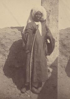 Portrait of a Young North African Man Standing Against a Pillar, 1865. Creator: Théodule Deveria