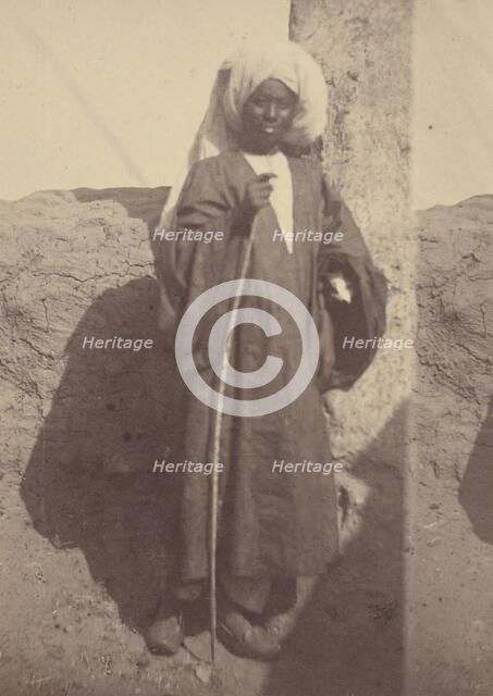 Portrait of a Young North African Man Standing Against a Pillar, 1865. Creator: Théodule Deveria.