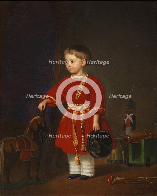 Portrait of a boy in a red dress with military toys.
